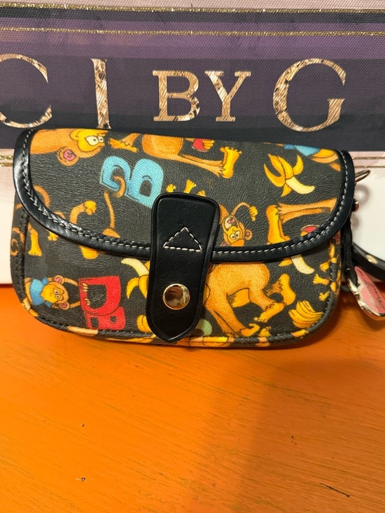 Dooney & Bourke Handbags - Dooney & Bourke Rare Limited Edition Monkey Wristlet EUC